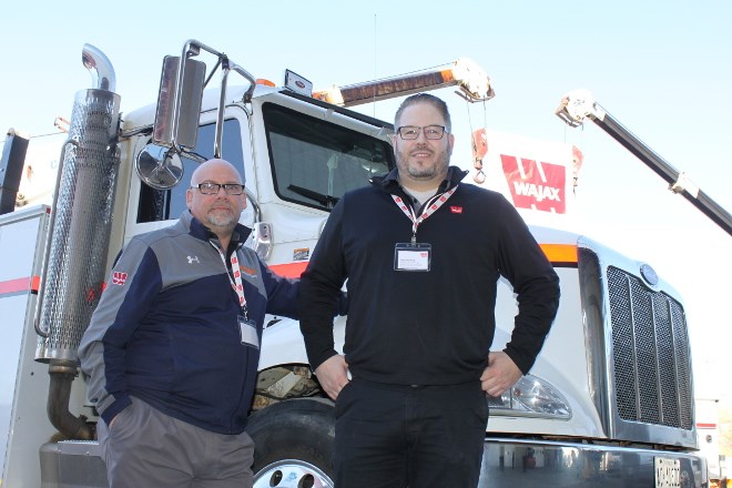 Norm Leduc (left), branch operations manager at Wajax, and Kyle Doherty, regional sales manager for Northern Ontario, recently celebrated the December opening of its new 42,500-square-foot facility in the Walden Industrial Park. (Lindsay Kelly photo)