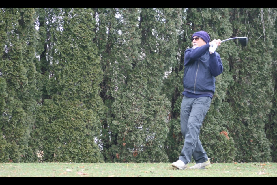 Brian Dimitroff tees off at the St. Davids Golf Club New Year's Day.