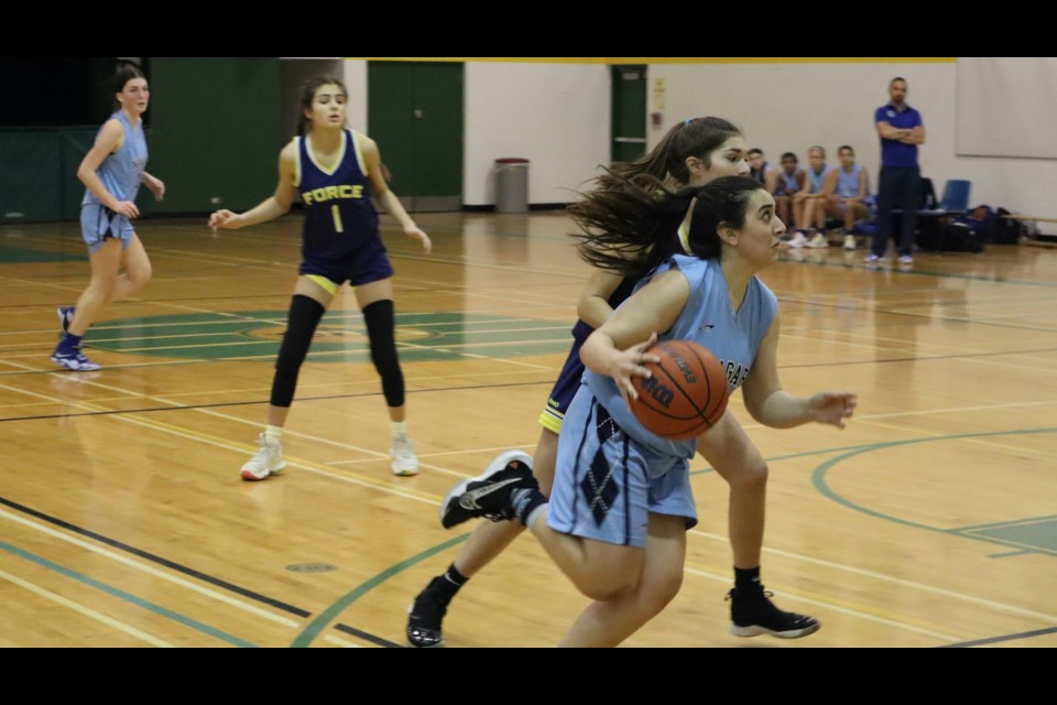 Rangers Melia Kotsanis drives to the Burlington basket.