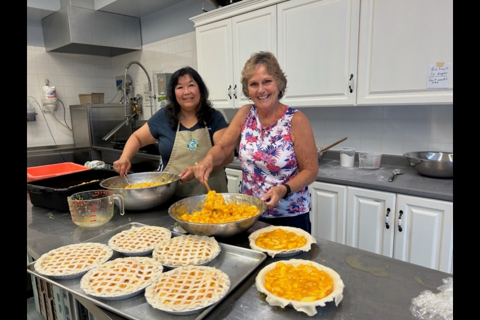 Dorothy Soo-Wiens and Kathy Dyck made pies in September to raise money for the Terry Fox Foundation. 