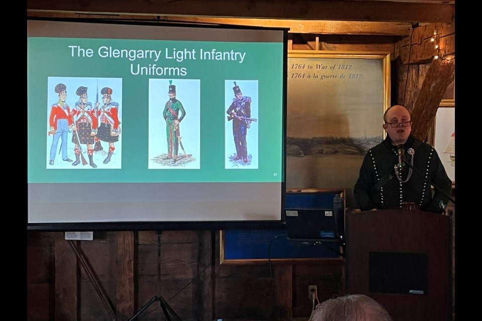 Peter Martin, Parks Canada Visitor Experience Product Development Officer and Special Events Coordinator, explains the uniforms worn by the Glengarry Light Infantry.
