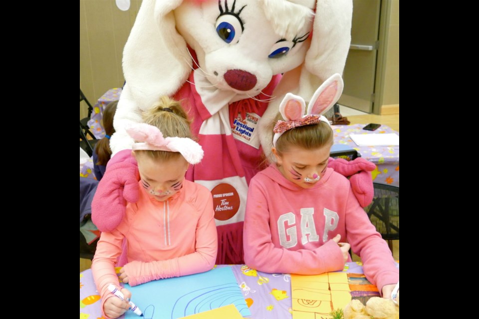 Morgan and Audrey Bowen got creative at the Niagara Nursery School Bunny Trail in 2019, with Crystal the Bunny. Crystal will be helping put packages for pickup together for kids this year. (File photo)