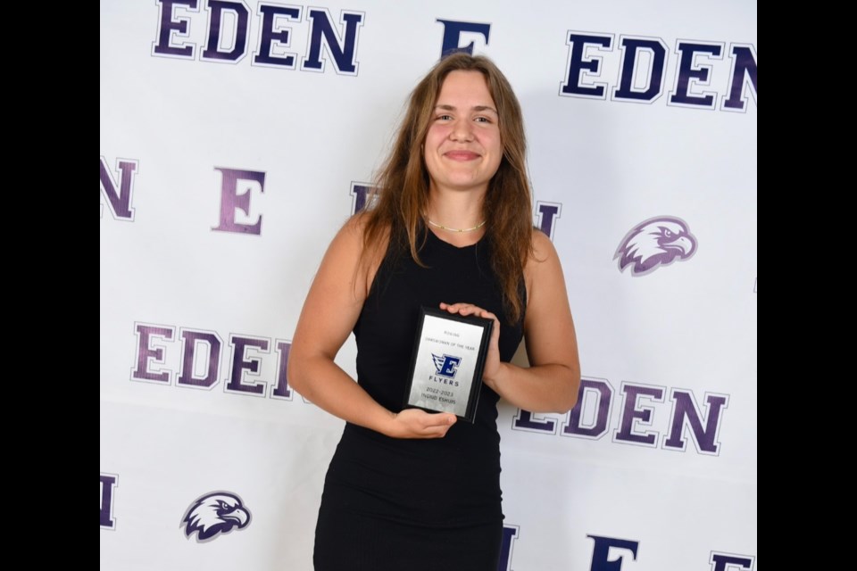 Ingrid Eshuis holds her Oarsperson of the Year Award, presented to her at Eden's annual athletic awards event in June