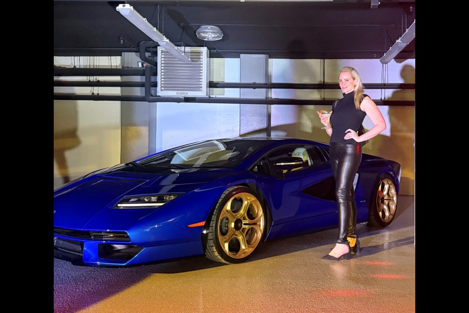 Niagara 5000 founder and CEO Alana Hurov poses with a Lamborgini Countach.