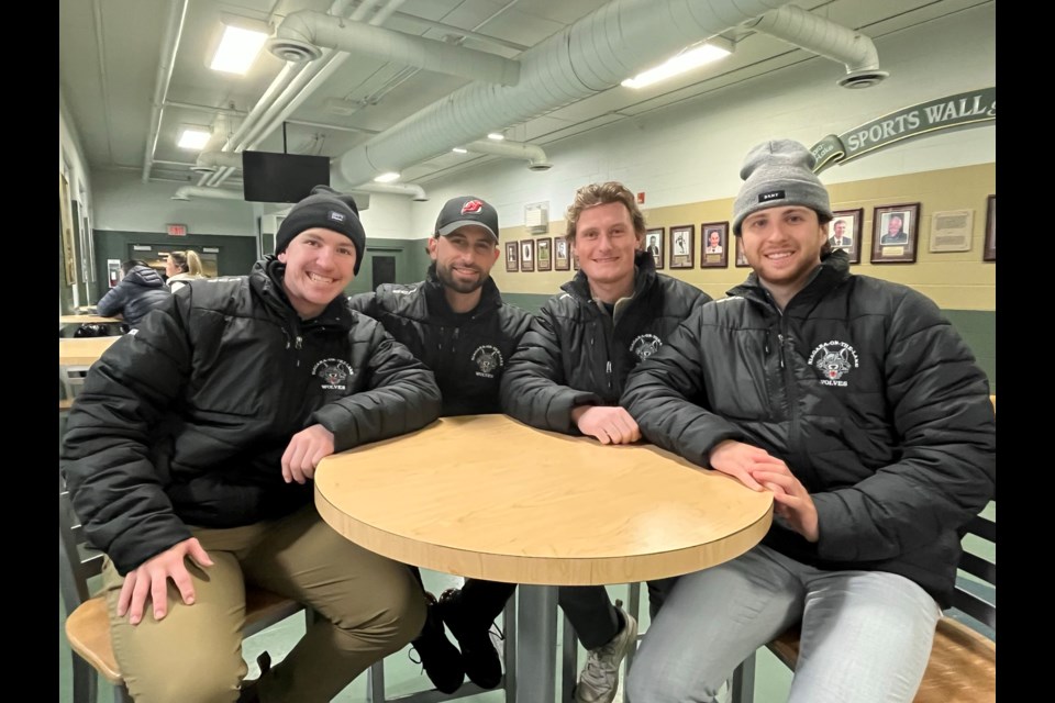 L-R: Head coach Devon Neudorf, trainer Kyle Juras, assistant coaches Mackenzie Berg and Alex Read