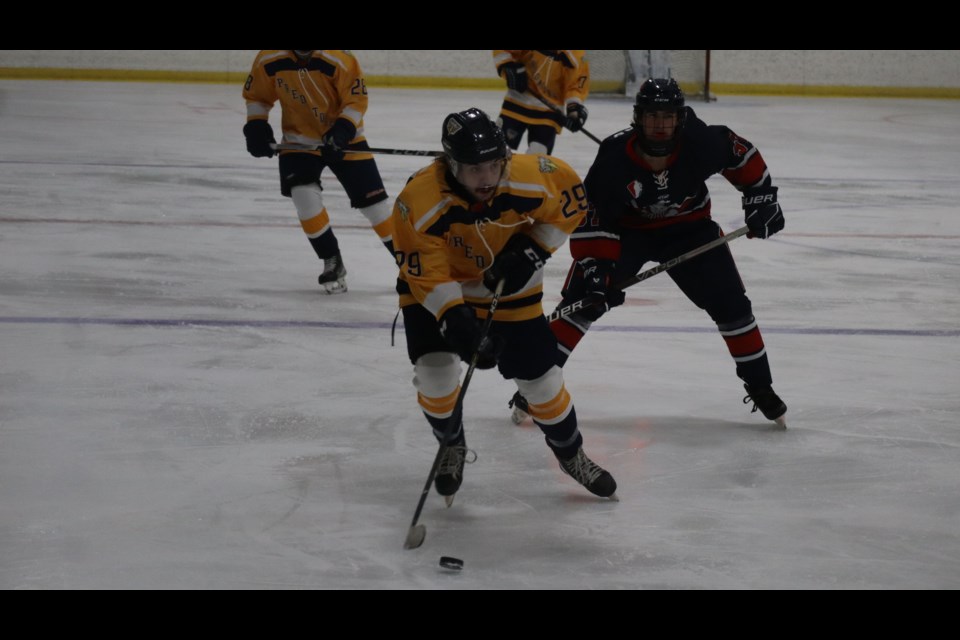 Predators forward Reese Bisci moves the puck into the Railers' zone