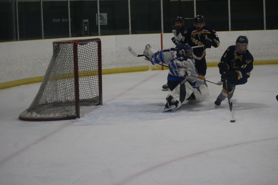 Nolan Wyers beat goalie Justin Sheets but lost the puck off his stick and couldn't capitalize on the open net. 