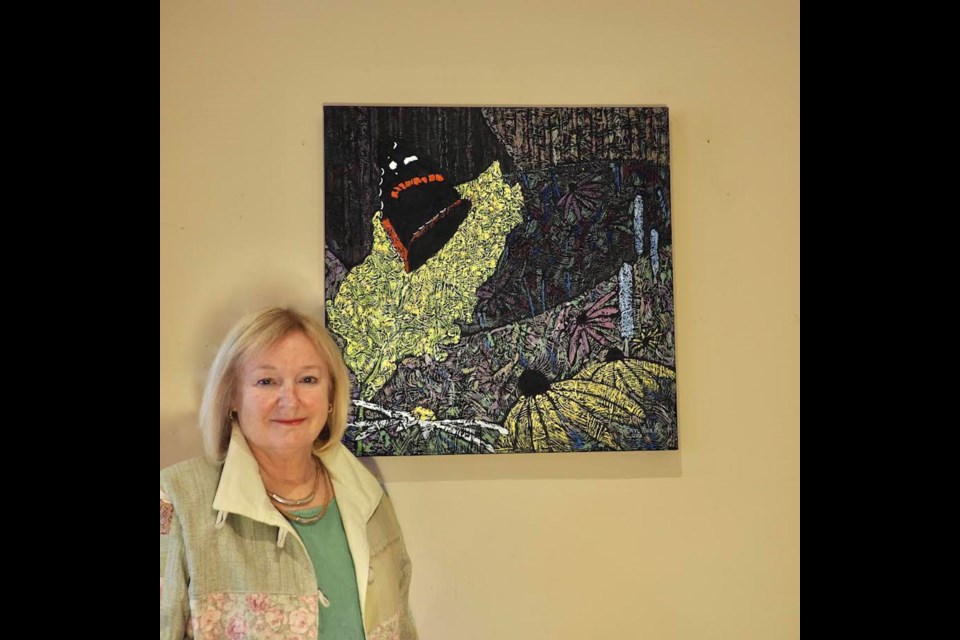 Cheryl Bailey with her acrylic on canvas Pick Me!     