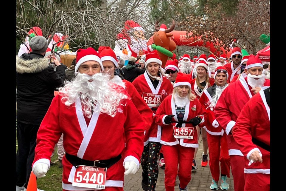 A sea of red Santa suits took over Simcoe Park and the streets of NOTL for the third straight year.