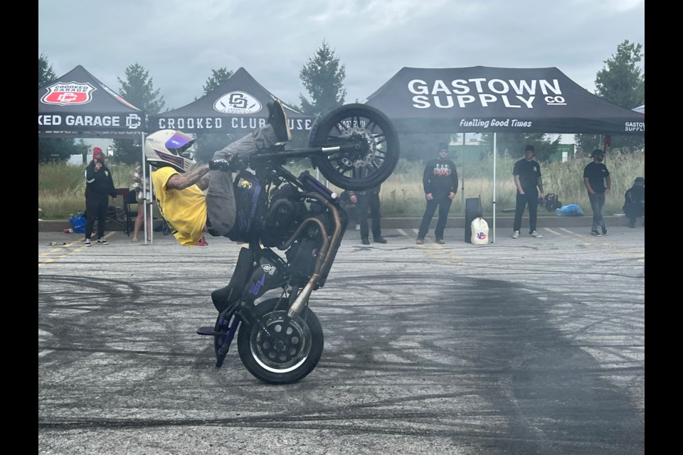 Christian Restivo does a wheelie at Clare's.