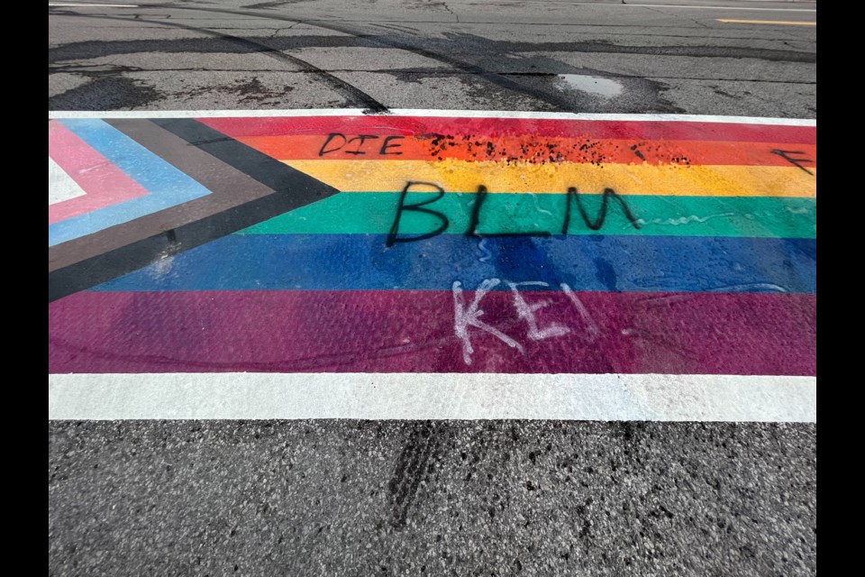 The latest vandalism to the pride crosswalk included a death threat and a reference to the Black Live Matter movement; NOTE: The Local opted to fade out a profane and hurtful reference that was part of this fourth incident