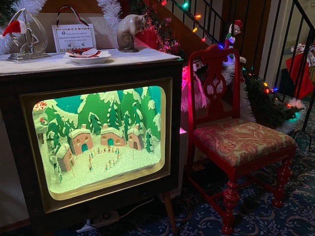 A scene from The Grinch Who Stole Christmas is depicted in miniature inside an old TV box. North Vancouver's Melanie Lane has made a number of these creations during the COVID-19 pandemic. 