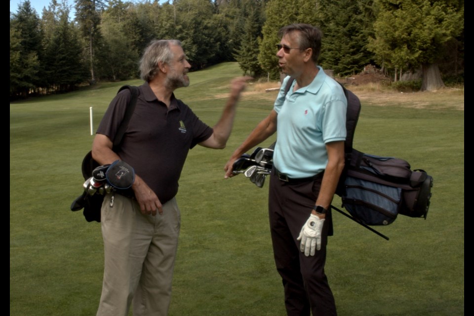 Clive Scarff and and Jon Borrill play Ray and Bogart in the movie Why You Suck at Golf, a passion project the pair put together during the pandemic. The film was shot mostly on Bowen Island and in West Vancouver