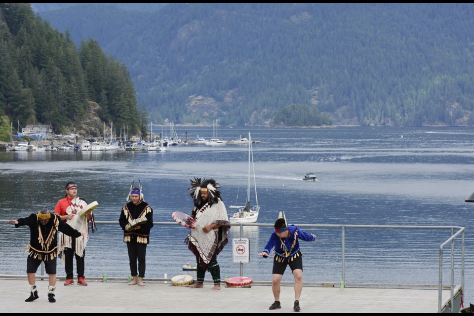 The Children of Takaya Dance Group performs in Panorama Park in Deep Cove ahead of a reception for the art show on Saturday, Aug. 13, 2022.