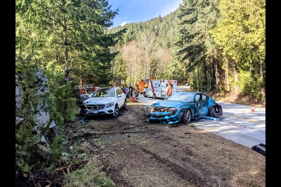 West Vancouver police prepare to pull a wrecked BMW from Cypress Bowl Road on Wednesday (March 10). The 20-year-old driver told investigators he was attempting to "drift."