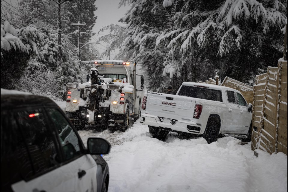 A truck driver lost control in slippery conditions on West Vancouver's 15th Street and crashed into a fence Wednesday morning. Luckily nobody was injured.