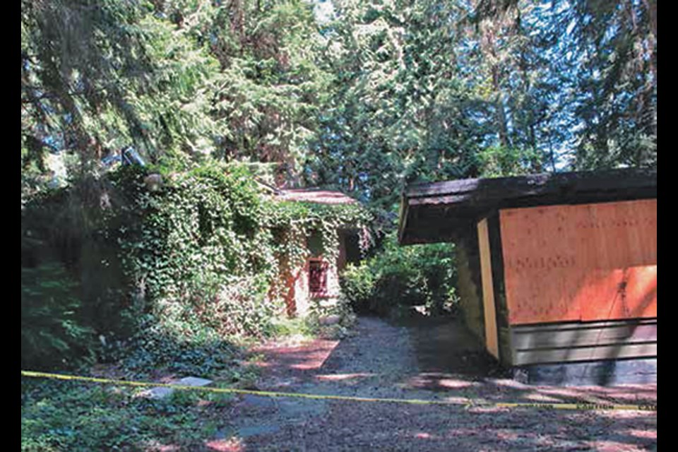 A small one-room guest house at the front of the former Forster Residence shows damage from a fire, in a photo from 2020 included in a conservation plan prepared by heritage consultants Donald Luxton & Associates Inc. that same year.