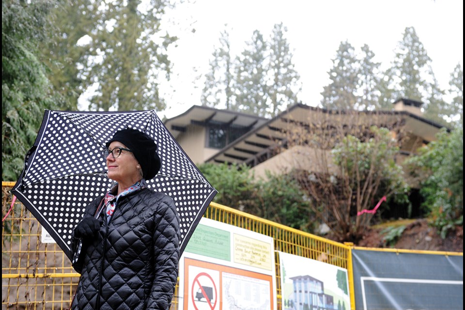 Paula Grossman, chair of the West Vancouver heritage advisory committee, stands in front of Toby House, a shining example of West Coast Modernism, which now has legal protection from demolition.