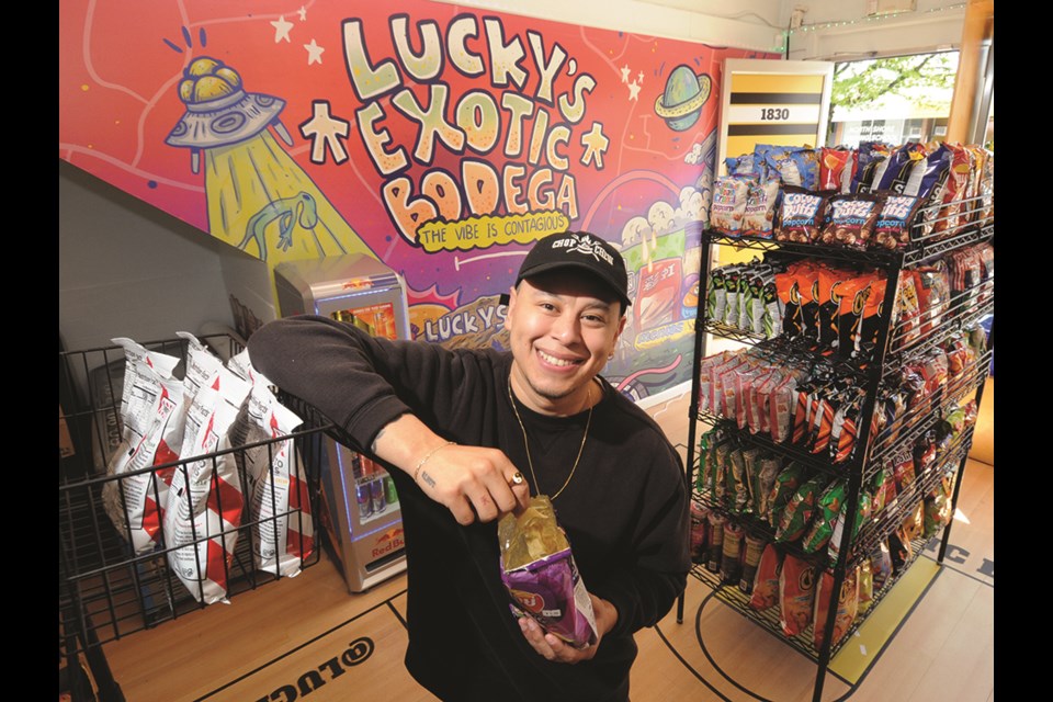 Lucky's Exotic Bodega manager Mario Prado shows off some of the unique treats available at the new Lonsdale Avenue store.         