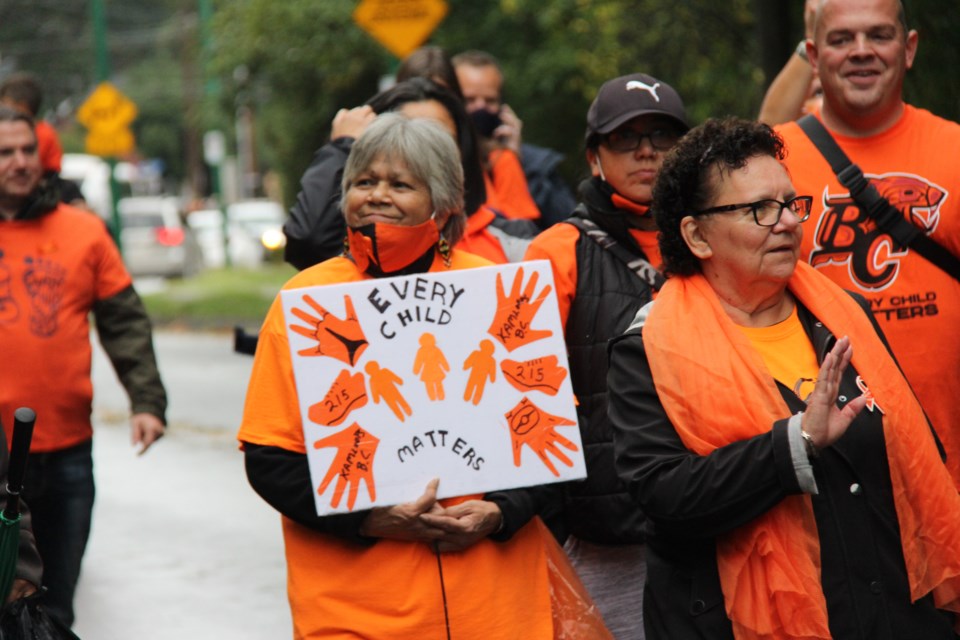 Tsleil-Waututh members walked 8.5 kilometres through North Vancouver to the former St. Paul's Residential School site to commemorate National Day for Truth and Reconciliation on Sept. 30, 2021.