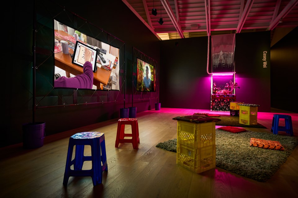 Casey Wei's installation, The Zhang Clan, spreads across three screens, diving into the story of her mother’s family immigrating to Melbourne, Australia from China after the 1989 Tiananmen Square massacre. | Akeem Nermo