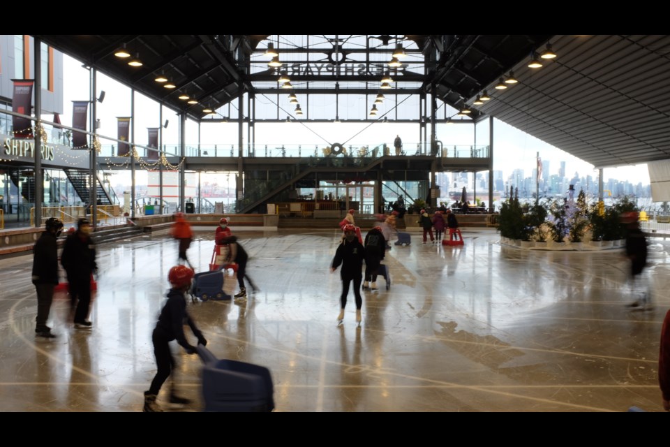 Ridgeway Elementary students are the first to skate on the ice as the City of North Vancouver Mayor Linda Buchanan opens up The Shipyards Skate Plaza for holiday skating.