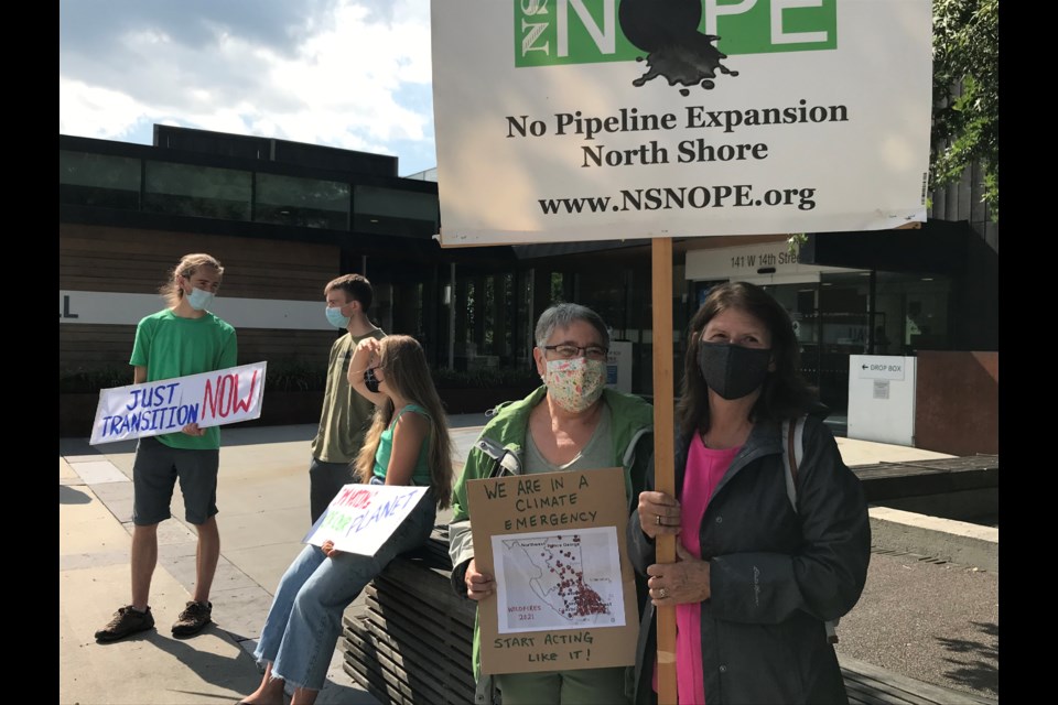 Janice Edmonds from North Shore NOPE (right) and Deep Cove resident Lesley Edwards were among those rallying for action on climate change Wednesday, Sept. 8, 2021, in North Vancouver
