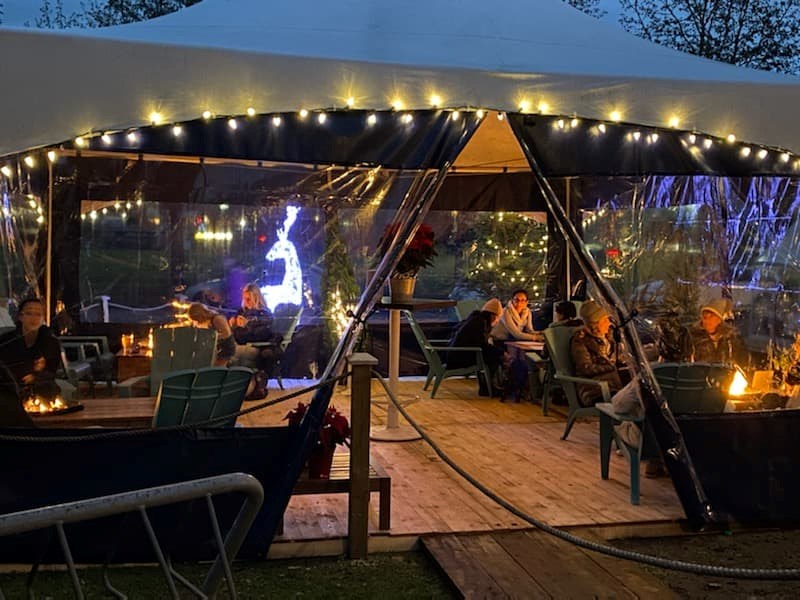 The Boat Shed cafe at Ambleside Beach in West Vancouver now has an extra marquee patio area with fire pits. 
