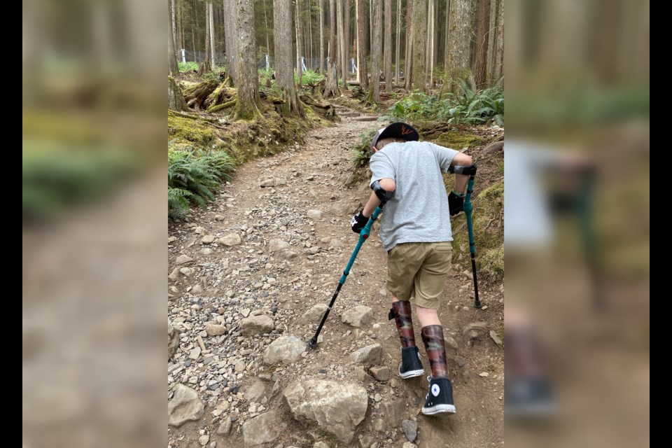 Richie Grimes climbs the Grouse Grind, a feat that took him 11 hours to accomplish. He plans to beat his old record on his 13th birthday. 