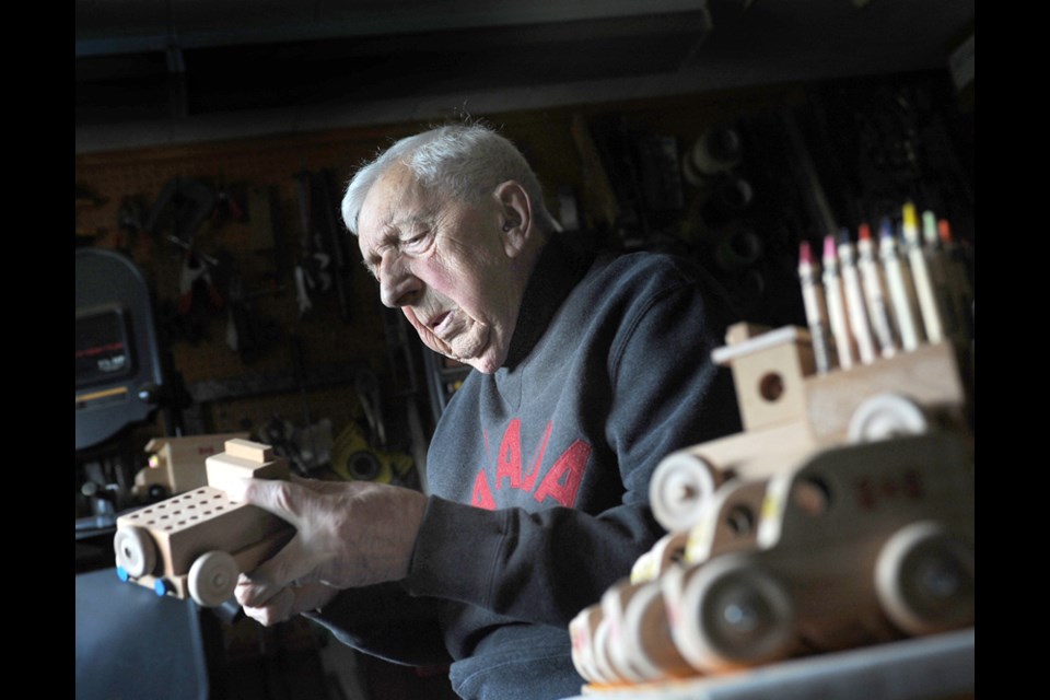 Toymaker Bill Chalmers, age 90, has been making wooden toys for North Vancouver Family Services Christmas Bureau for 27 years. Here he is in his workshop in November, 2020. 