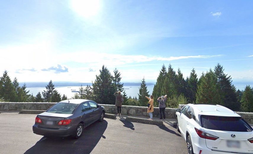 Visitors enjoy the lookout from Cypress Bowl Road. The province has purchased the land from British Pacific Properties after squatting there since the 1970s.