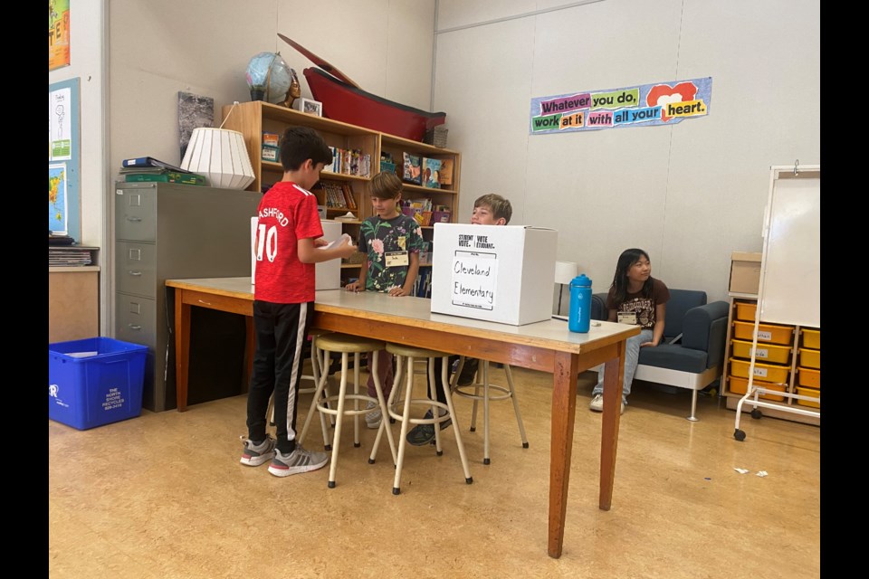 Students at North Vancouver's École Cleveland Elementary participated in a mock voting day Friday for the municipal election, Oct. 15, 2022. 