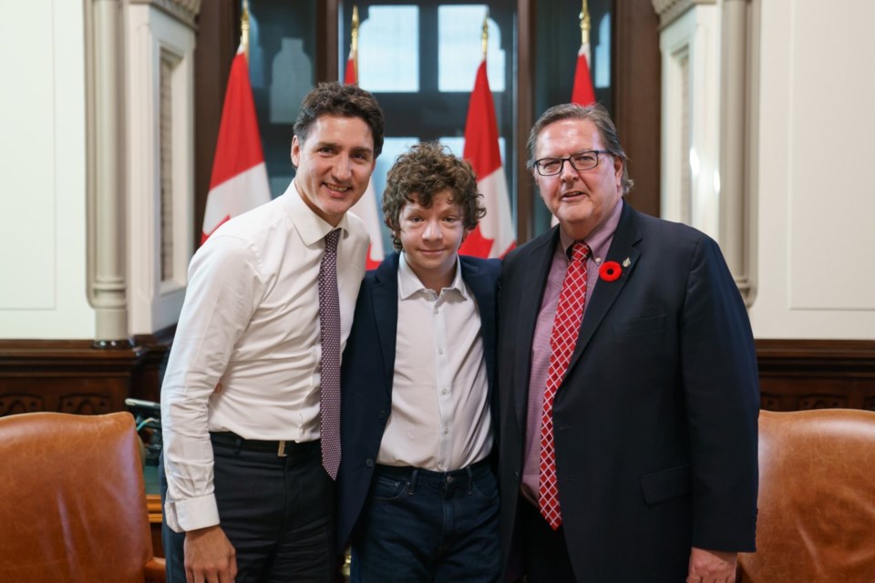 Prime MInister Justin Trudeau meets with James Maloney and his nephew Brogan in West Block on Pariliament Hill in Ottawa, Nov. 1, 2022.