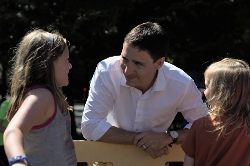 Prime Minister Justin Trudeau talks to kids at Parkgate Society Day Camp on Tuesday.