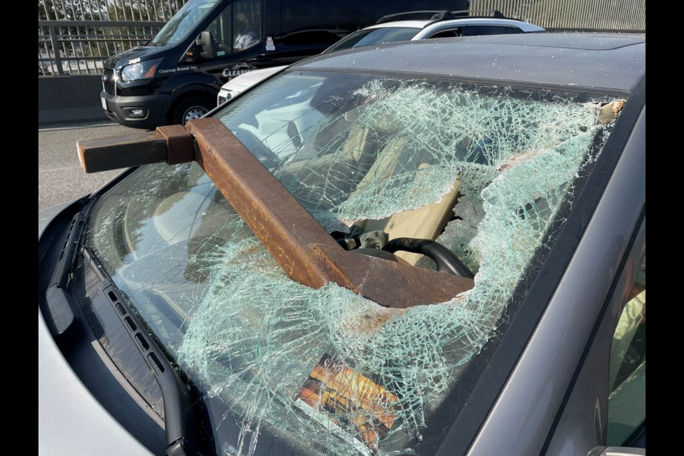 Police in Vancouver are hoping to identify the driver of a truck that crossed to North Vancouver on the Ironworkers Memorial bridge just before 2 p.m. on Friday, Oct. 7, 2022. A metal beam fell from the truck and struck a car, narrowly missing Squamish mom Susan Milne. 