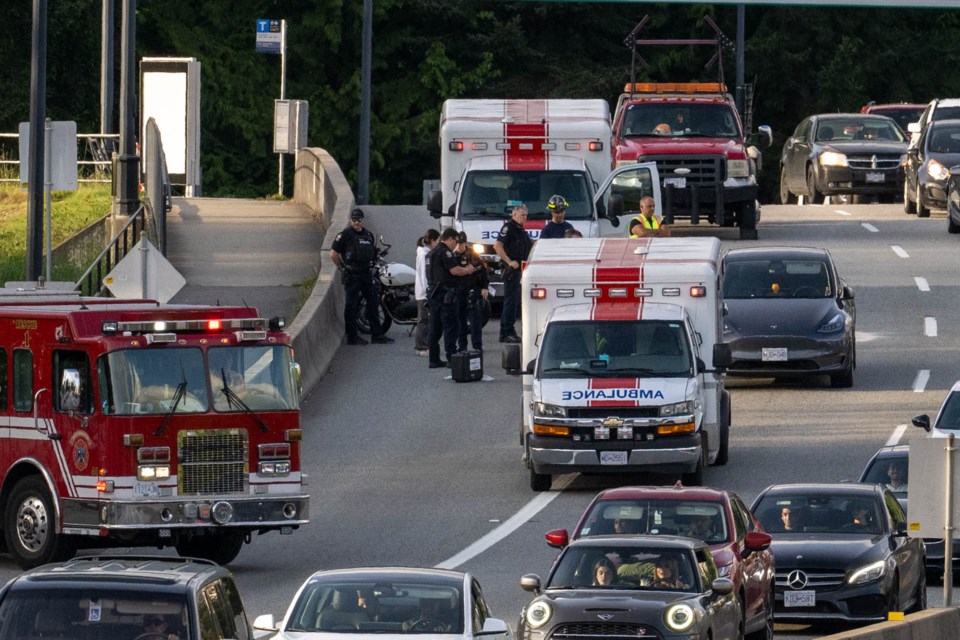 West Vancouver police get a statement from the Tesla driver following the crash on Wednesday evening. | Mark Teasdale