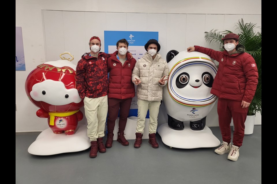 Trevor Philp, Brodie Seger, Jack Crawford and Broderick Thompson of Canada's Olympic alpine ski team take in the sights at the Beijing 2022 Olympic Games. 