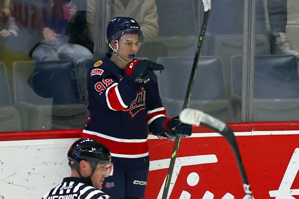 Connor Bedard celebrates a goal for the Regina Pats. 