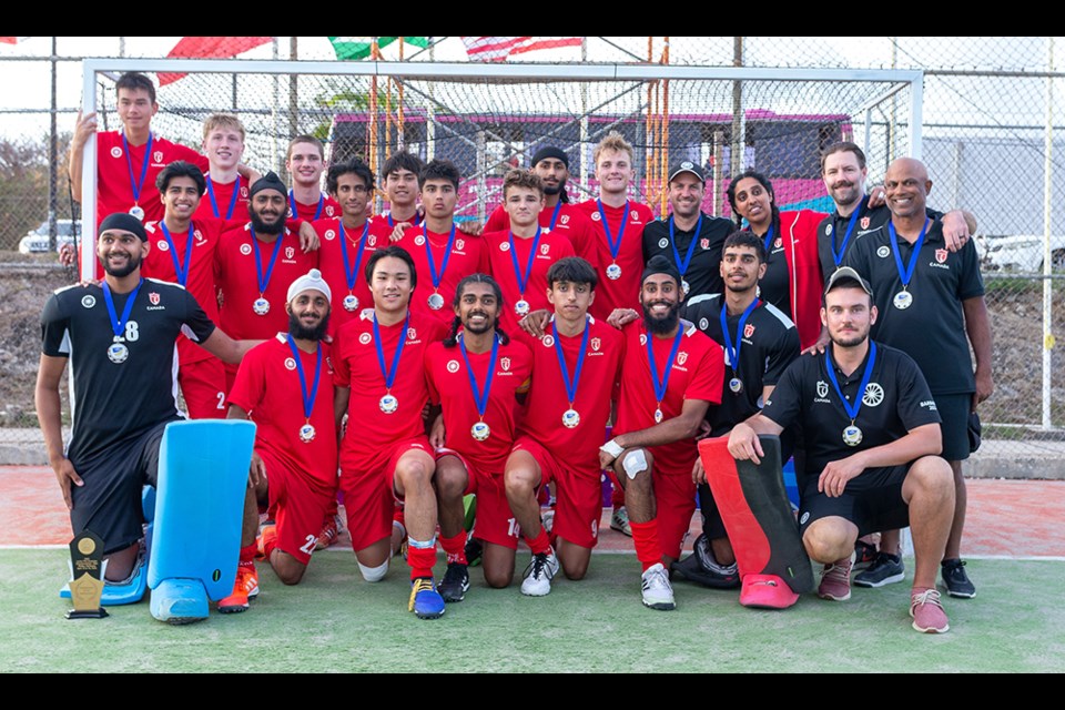 Canada’s men’s junior national team celebrates a silver-medal finish at the 2023 Men’s Pan American Junior Championship April 17 at the Sir Garfield Sports Complex in St. Michael, Barbados. The second place finish earned them a berth in the Junior World Cup scheduled for December. | WorldSportPics / Rodrigo Jaramillo