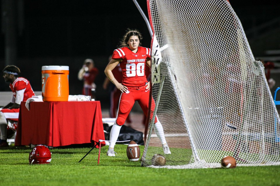 North Vancouver's Kristie Elliott warms up during a Simon Fraser University football game in 2019. Elliott made history on Sept. 11, 2021, when she became the first female player to score for a Canadian college football team. 