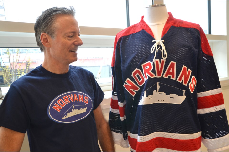 North Vancouver hockey historian Chris Mizzoni proudly dons the crest of the Norvan Shipyards, April 19, 2022.