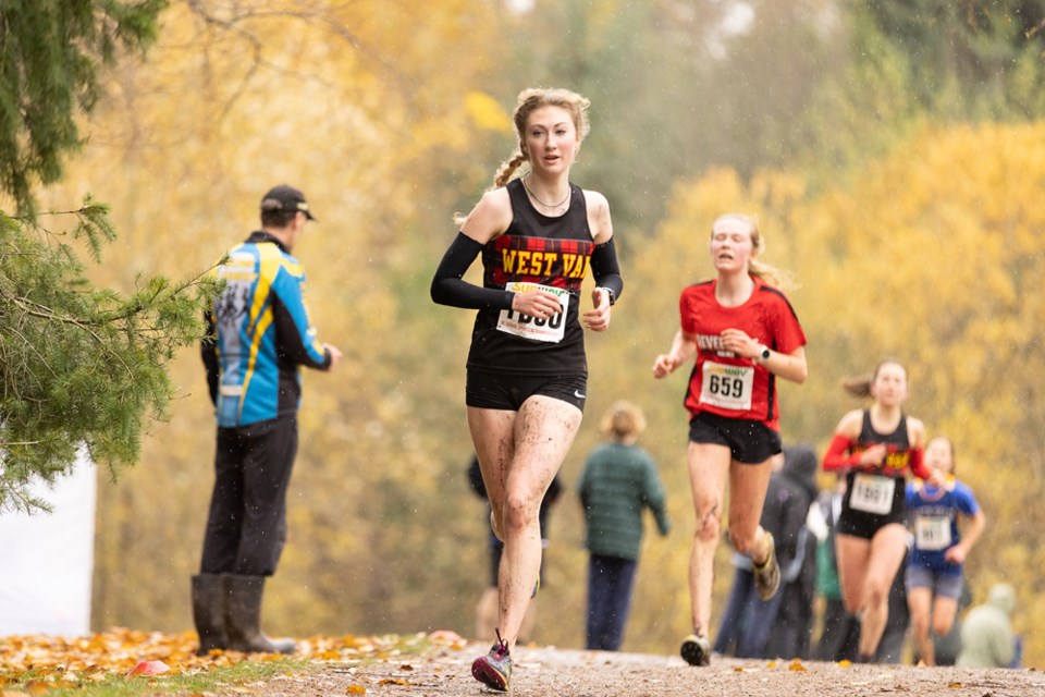 West Vancouver's Rachel Watkins leads her team to a first-place finish at the B.C. senior girls high school cross-country running championships held Nov. 6 at Vancouver's Jericho Beach. 