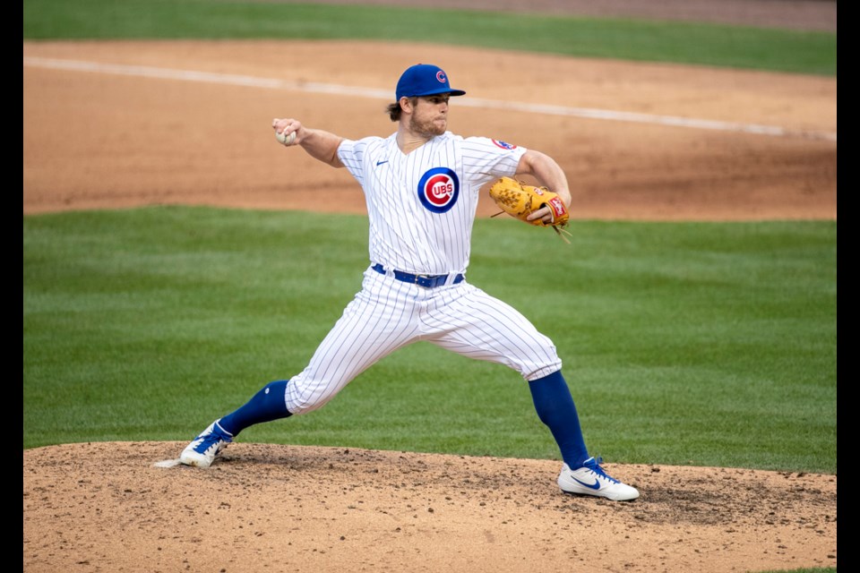 North Vancouver's Rowan Wick fires a pitch for the Chicago Cubs at Wrigley Field during the COVID-shortened 2020 season.