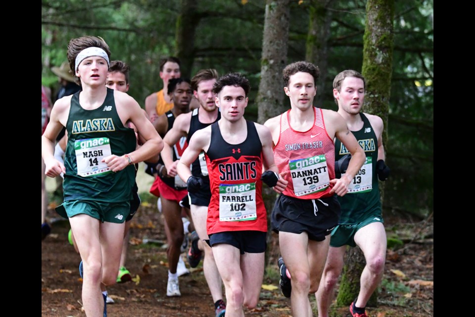 North Vancouver's Charlie Dannatt charges his way to bronze at the GNAC cross-country running championships held Saturday, Oct. 23 in Lacey, Wash. SFU won both the men's and women's team GNAC titles at the championships. 