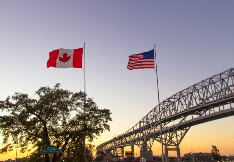 canada-us-flags-jpg