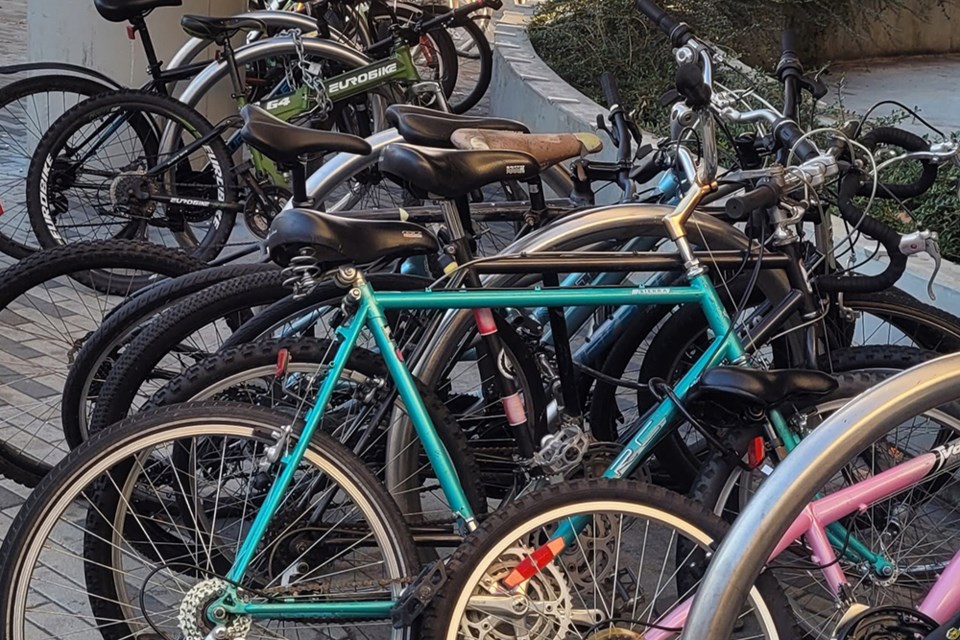 Bikes sit locked to an outdoor bike rack near Lonsdale Quay in North Vancouver. Columnist Heather Drugge writes that the North Shore should have more secure bike storage options at transit hubs.
