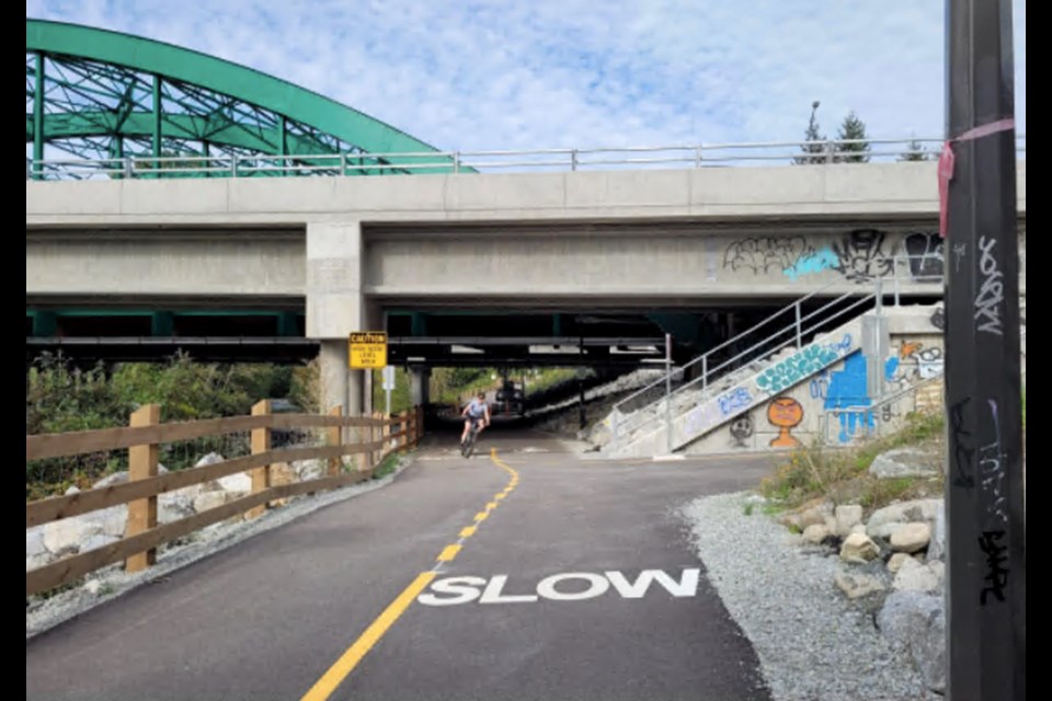 This is the new walking/cycling path heading north along Lynn Creek under the two Highway 1 bridges in North Vancouver. This path links Capilano University to the new Lower Lynn town centre and eventually beyond to Iron Workers Memorial Second Narrows Crossing.