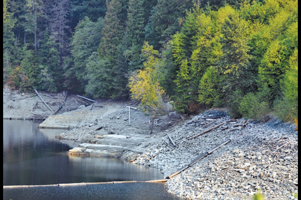 The Capilano water reservoir behind Cleveland Dam shows signs of dropping, Oct. 17, after a prolonged drought this summer and early fall.