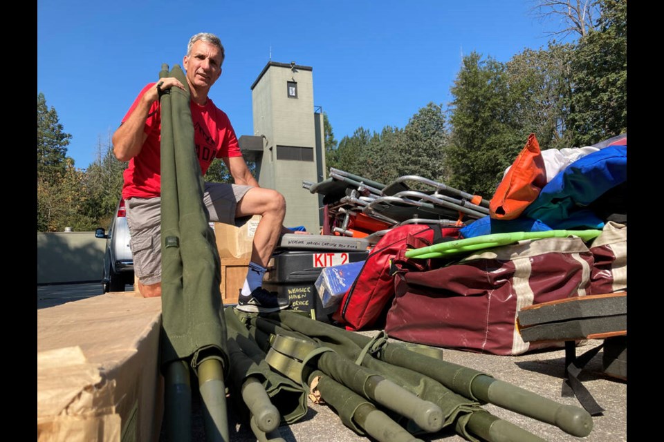 Retired Sgt. Doug Setter of the Canadian Armed Forces sees off Thursday's shipment at District of North Vancouver Fire and Rescue Services' training centre. Setter is the warehouse ops director for Defend Ukraine. He served in the Canadian Airborne Regiment and a United Nations Peacekeeping tour of former Yugoslavia (now Croatia).