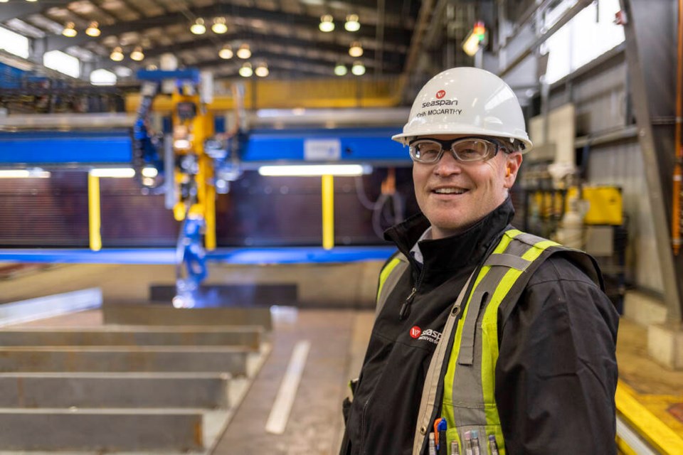 John McCarthy stands at Vancouver Shipyards in January 2021.
